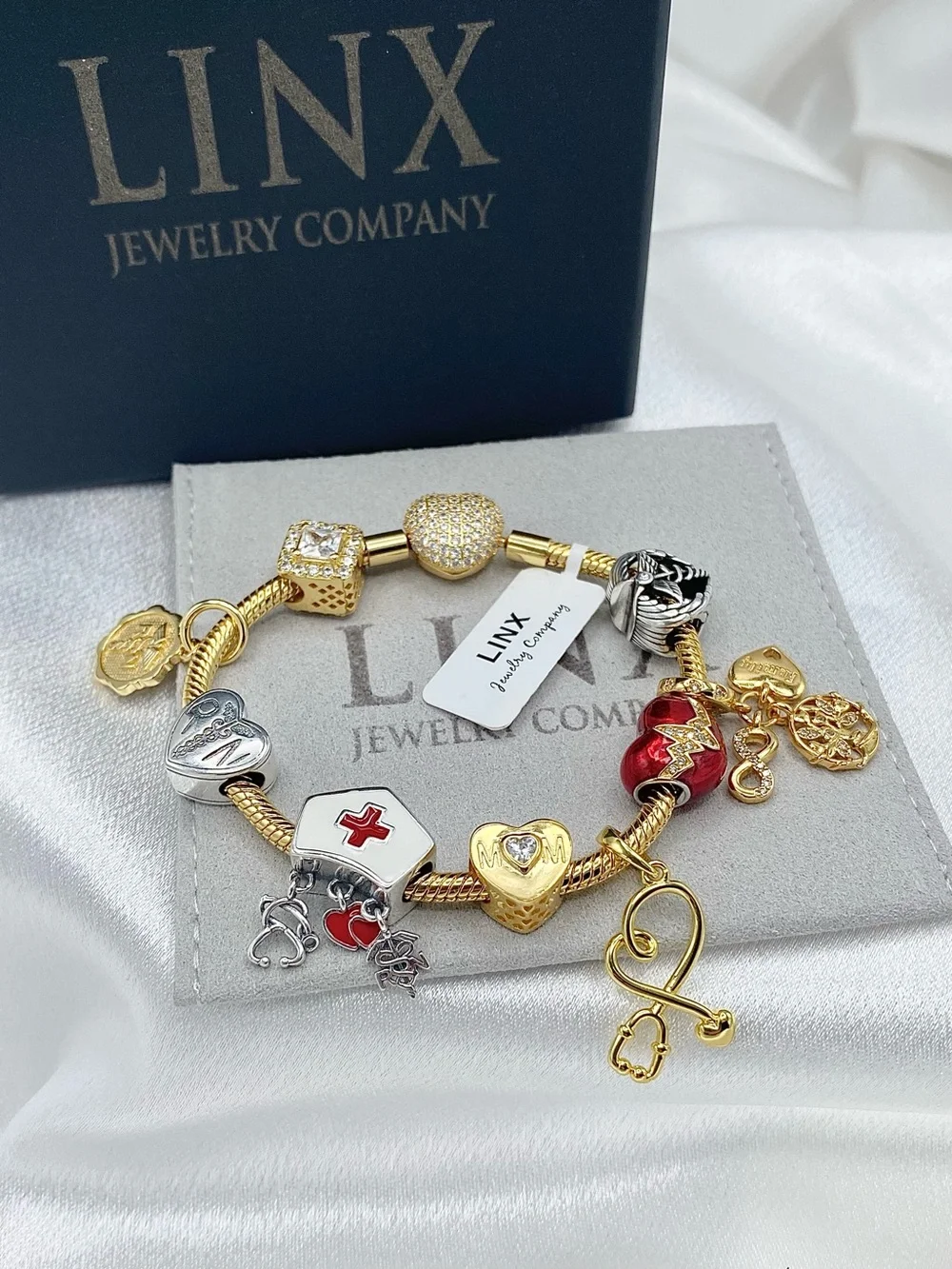 Linx Gold Snake Chain Charm Bracelet with Registered Nurse, Mom & Family Charms